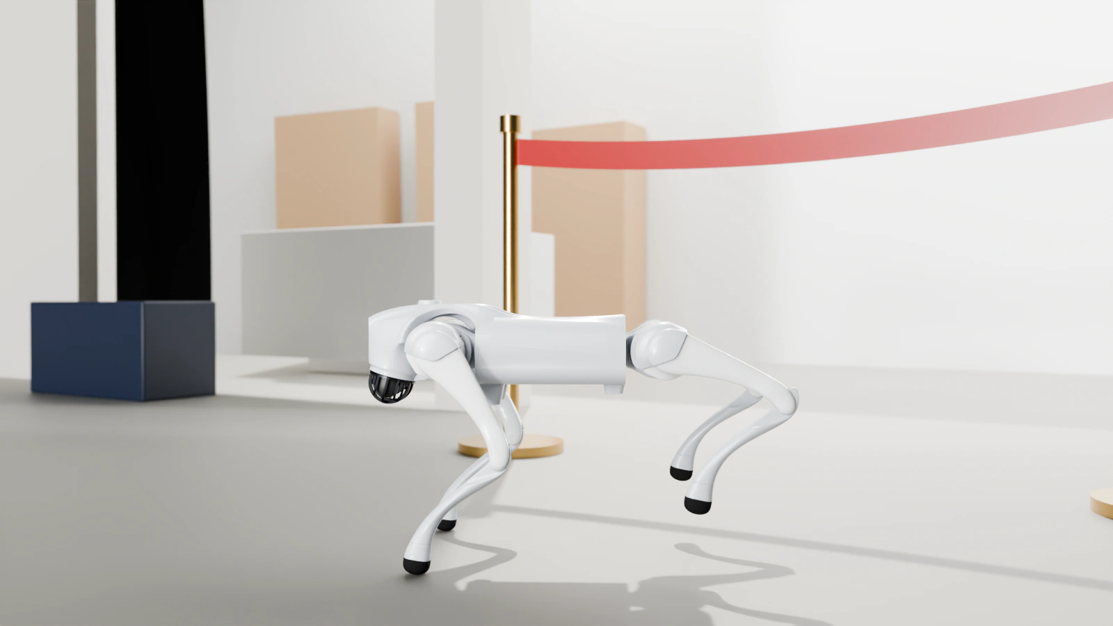 Robotický pes Unitree Go2 u vchodu do nové prodejny za denního světla